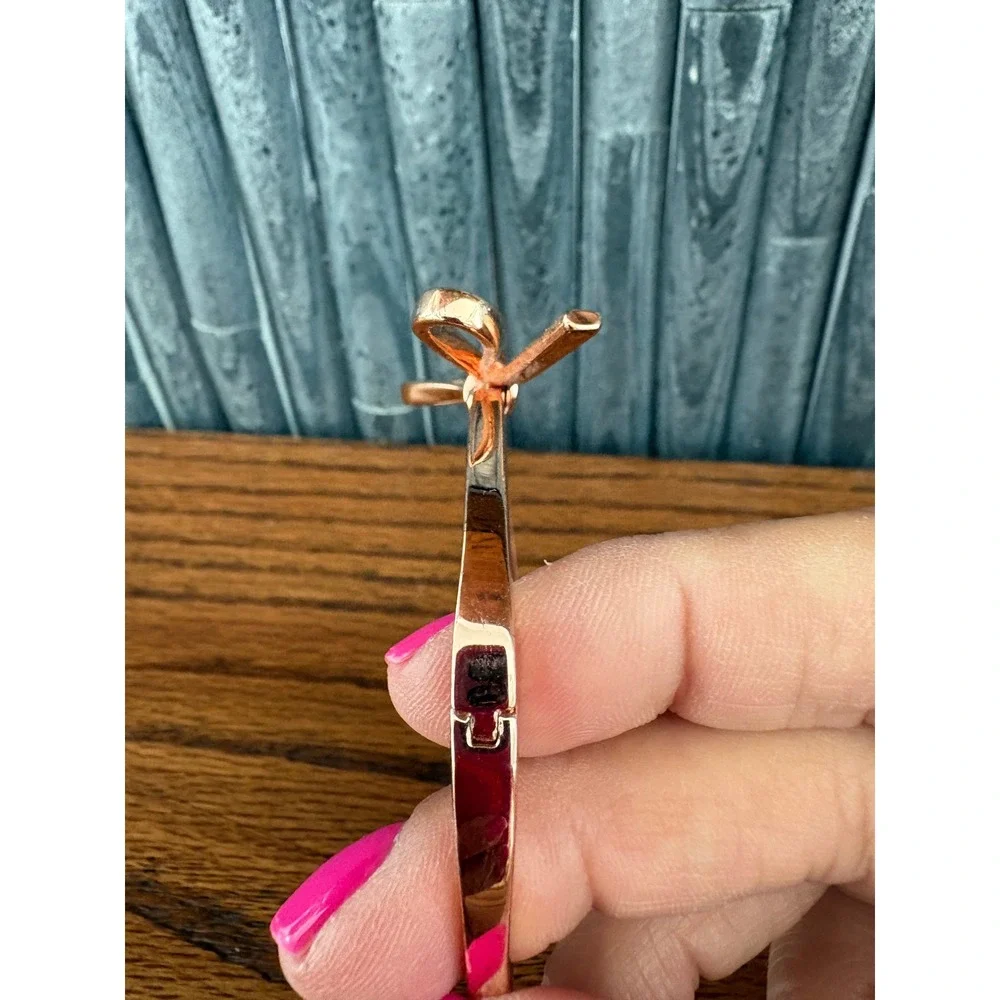 Kate Spade New York Skinny Bow Bangle Bracelet Rose Gold Tone Hinged Cuffs